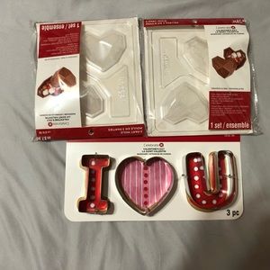 Brand new with tags! Cute, fun three Piece metal cookie cutters.